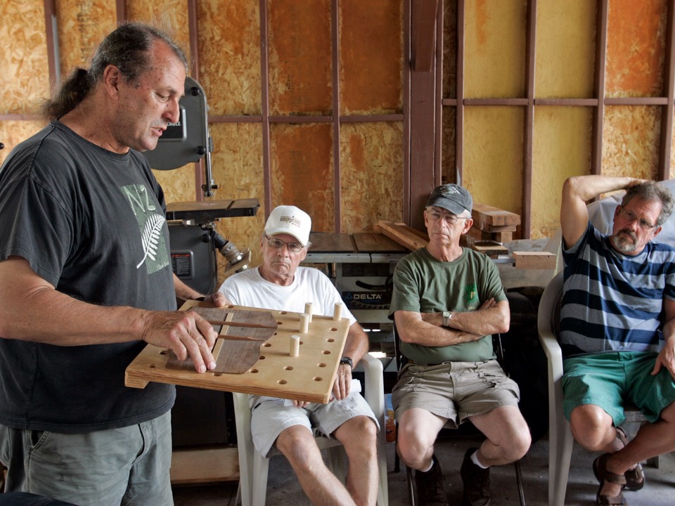 BIUG Secretary/Treasurer Bob Gleason shows members how to build a brace-carving jig