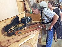 01 - Charles Newcomb and Barbara Bach take a look at steel guitars built at The Makery