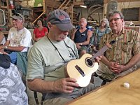 11 - Sam Rosen has a look at Doug Powdrell's ukulele